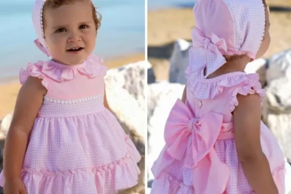 Niña con jesusito rosa