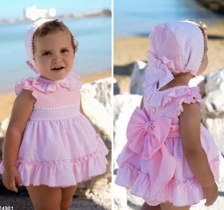 Niña con jesusito rosa